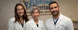 Image of the 3 doctors smiling wearing white coats